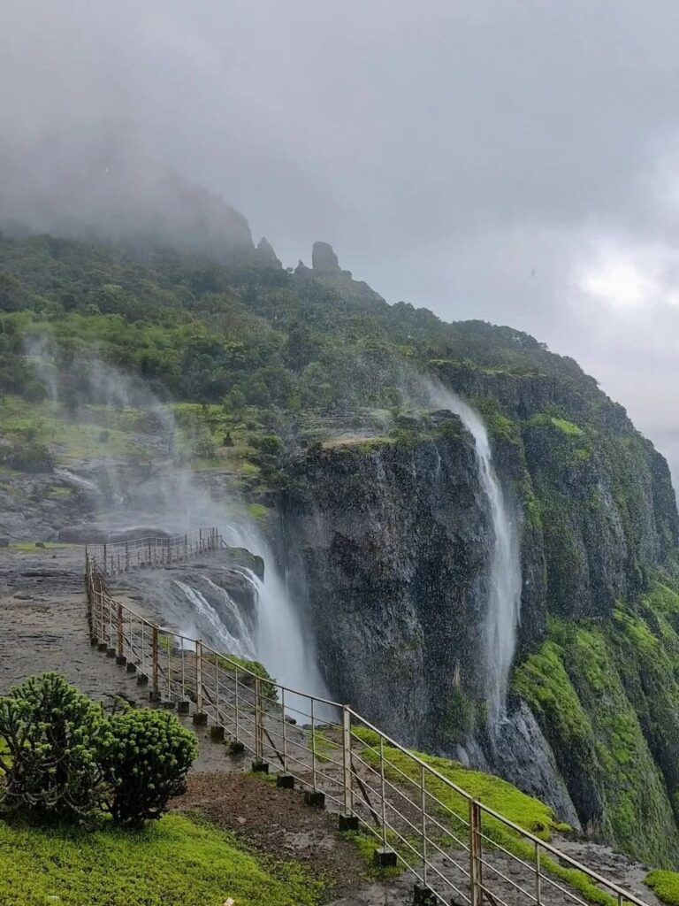 Mahabaleshwar scenic mountain valley viewpoint with lush green hills and winding trail